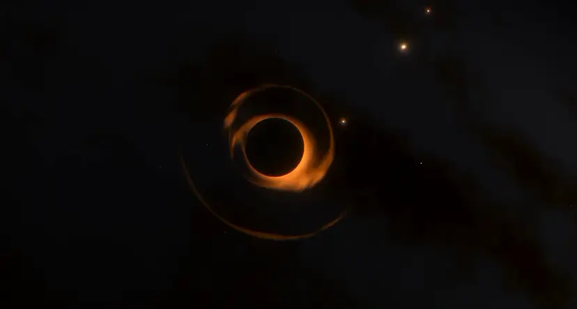 A slow total eclipse: a dark disc ringed by an amber corona among stars